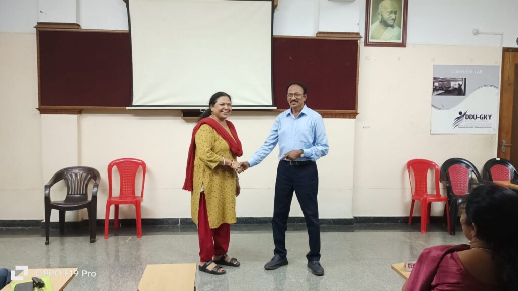 G S Smitha Nair is receiving the Best TAG Team Player award for Grammarian, Trivandrum Toastmasters Meeting 633."