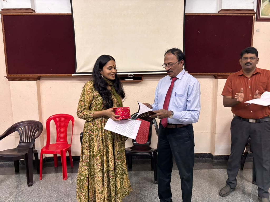 Induction of TM Parvathi as a new member of Trivandrum Toastmasters Club at Meeting 634