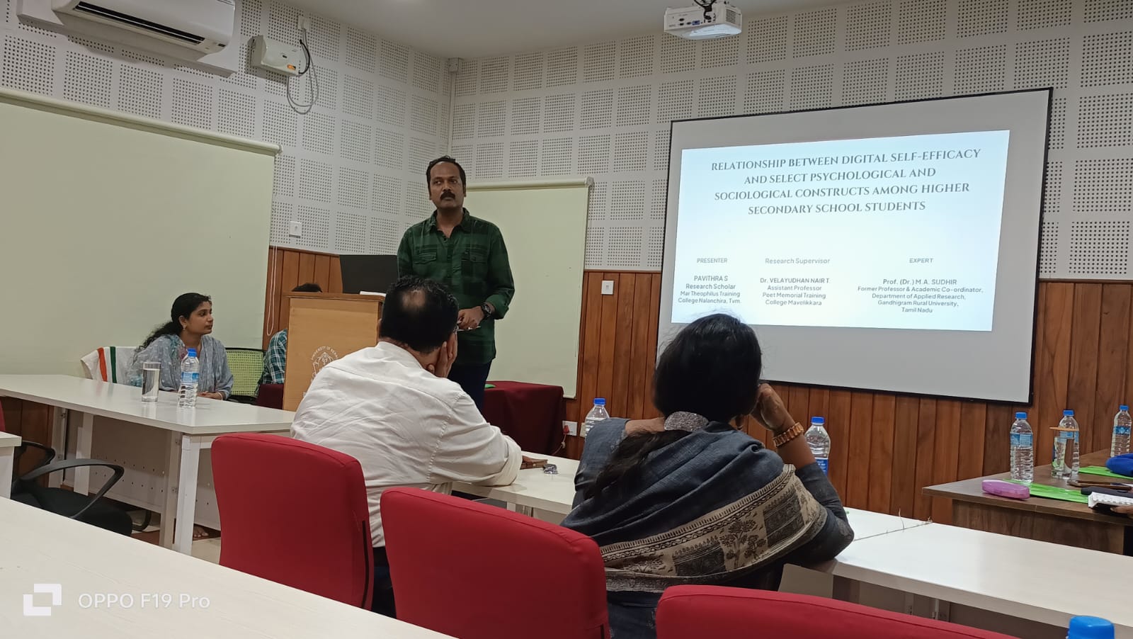 Pre-submission seminar slide on Digital Self-Efficacy, where a mother doing a PhD presents her research